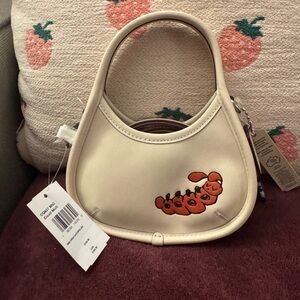 NWT- Coach- Coachtopia Mini Ergo with Caterpillar